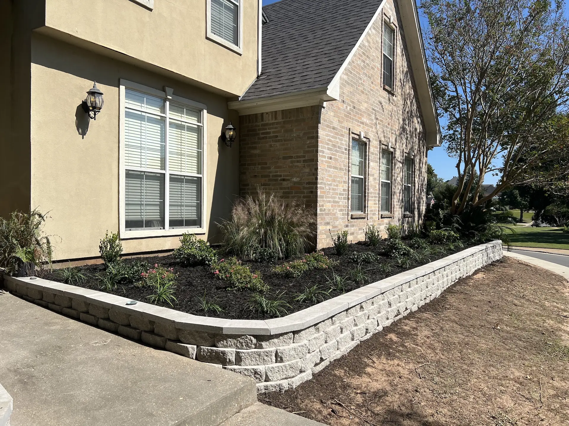 mulch and retaining wall installation